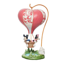 LOVE TAKES FLIGHT FIGURINE
