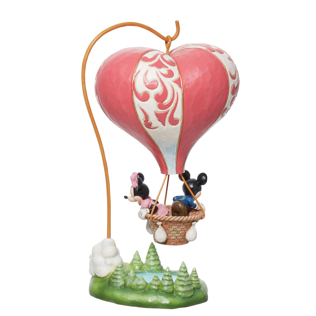 LOVE TAKES FLIGHT FIGURINE