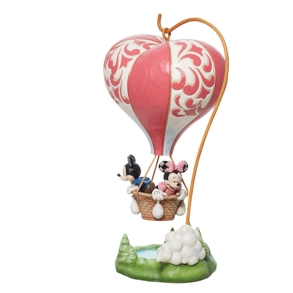 LOVE TAKES FLIGHT FIGURINE