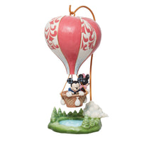 LOVE TAKES FLIGHT FIGURINE